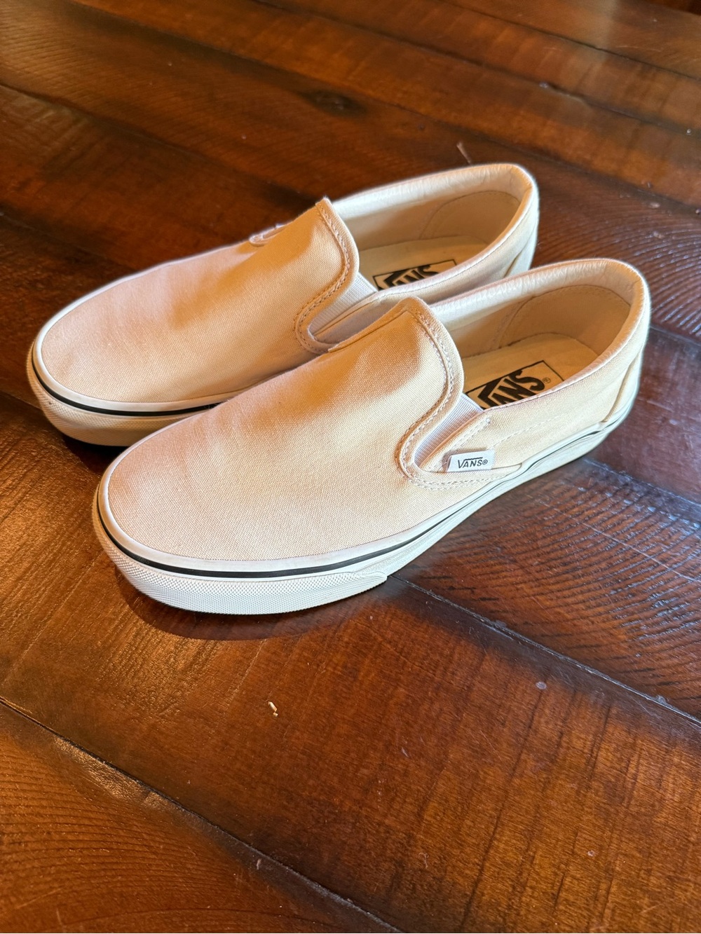 Vans Slip-On Canvas Sneakers in Cream and White